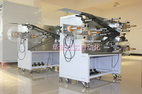 氣動控制張力卷繞機用于啟動電容器的生產(chǎn)中。